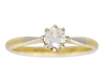 Lot 74 - An 18ct and platinum 0.25ct (est.) diamond solitaire ring.