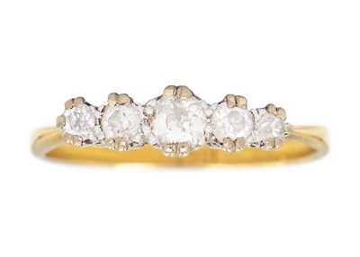 Lot 140 - An 18ct diamond set five-stone ring.