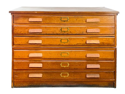 Lot 638 - A 20th century oak two part plan chest.