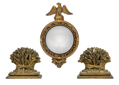 Lot 232 - A 20th century Regency style miniature giltwood mirror with convex mirror plate and eagle cresting.