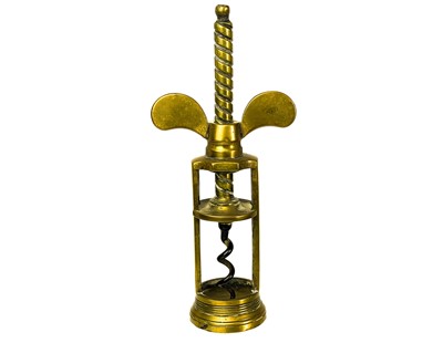 Lot 149 - A 19th century brass Farrow & Jackson type brass corkscrew.