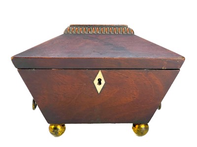 Lot 180 - A George III mahogany sarcophagus tea caddy.