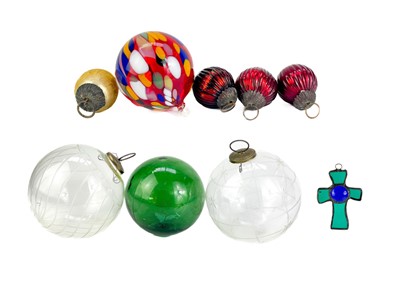 Lot 373 - A collection of glass hanging balls.