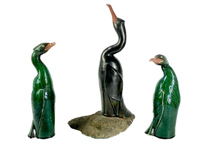 Lot 486 - Humfrey Wakefield - A pottery cormorant on stone stand.