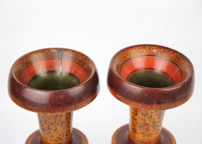 Lot 138 - A pair of Persian wood vases, early 20th century.