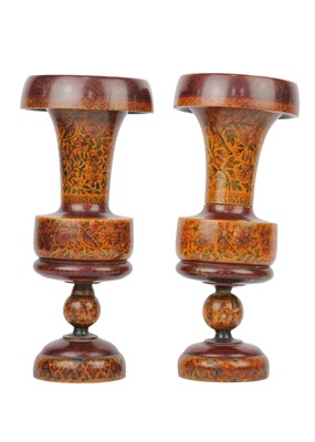 Lot 138 - A pair of Persian wood vases, early 20th century.