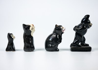 Lot 488 - A Winstanley pottery tabby cat.