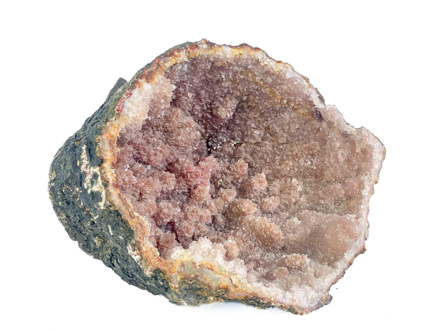 Lot 311 - A pink amethyst geode mineral specimen.