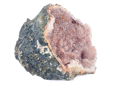 Lot 311 - A pink amethyst geode mineral specimen.