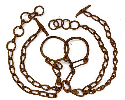Lot 139 - An iron horse tether chain.