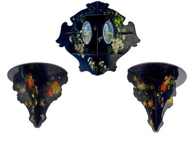 Lot 213 - A Victorian painted papier mache lacquered folding mirrored corner shelf.