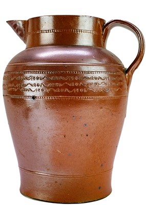 Lot 1206 - A large brown stoneware jug.