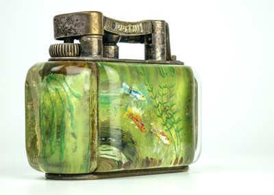 Lot 170 - A Dunhill Lucite and electroplate aquarium table lighter.