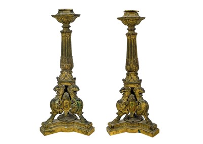 Lot 238 - A pair of Louis XVI style ormolu candleholders.