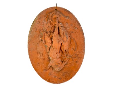 Lot 378 - A late 19th century French terracotta oval plaque.