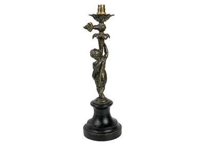 Lot 80 - A French bronze cherub table lamp.