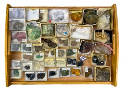 Lot 221 - Over fifty boxed and labelled minerals.