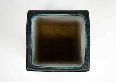 Lot 15 - A Troika St Ives square section vase.