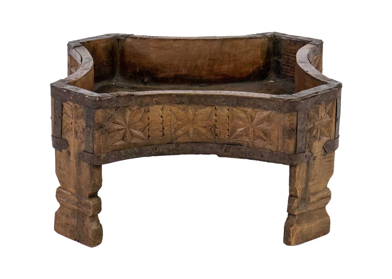 Lot 103 - An Indian carved wood planter / rice stand,
