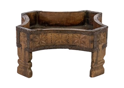 Lot 103 - An Indian carved wood planter / rice stand, early 20th century.