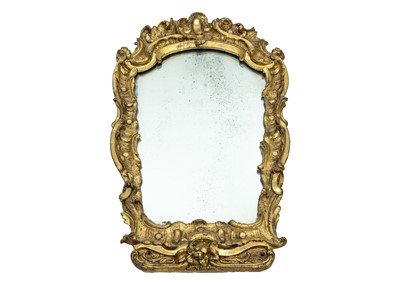 Lot 58 - An 18th century baroque wood carved gesso gilt mirror.
