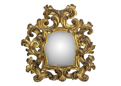 Lot 67 - An 18th century baroque wood carved gesso gilt mirror.