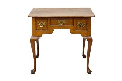 Lot 1087 - A George III oak lowboy.