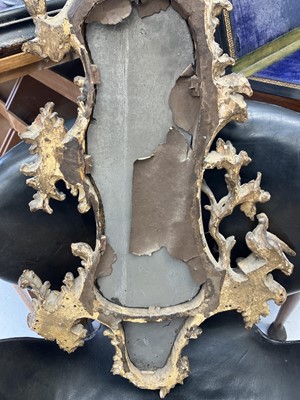 Lot 65 - A carved gilt wood and gesso girandole mirror.