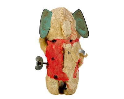 Lot 157 - A carved wood automaton in the form of a seated whipped with 'beating' heart.