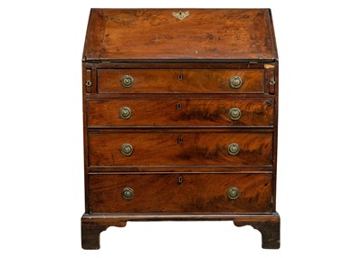 Lot 579 - A George III mahogany bureau.