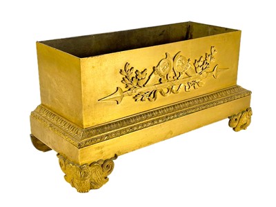 Lot 243 - A French Empire ormolu rectangular plinth base.