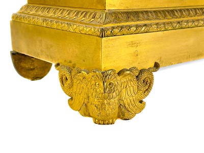 Lot 243 - A French Empire ormolu rectangular plinth base.