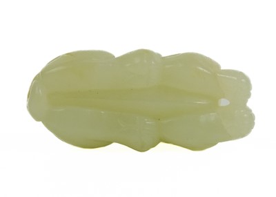 Lot 1036 - A Chinese jade Pixiu, late Qing Dynasty.