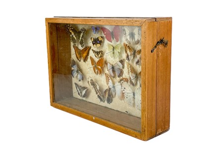 Lot 167 - A Victorian velvet framed bevelled edge wall mirror with integral shelf and pair of candle sconces.