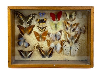 Lot 167 - A Victorian velvet framed bevelled edge wall mirror with integral shelf and pair of candle sconces.