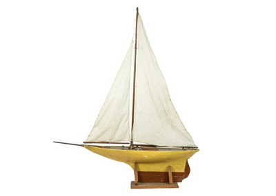 Lot 144 - An early 20th century pond yacht White Heather.