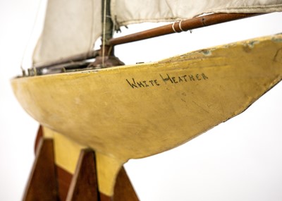 Lot 144 - An early 20th century pond yacht White Heather.