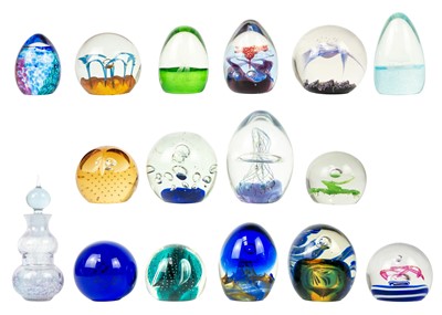 Lot 382 - A collection of paper weights.