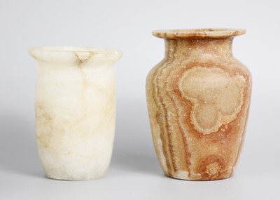 Lot 76 - Five Egyptian archaic style alabaster pots and vases.