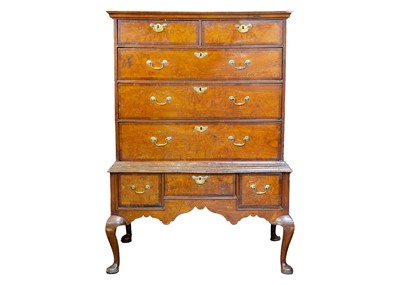 Lot 1000 - A George II burr elm and yew banded chest on stand.
