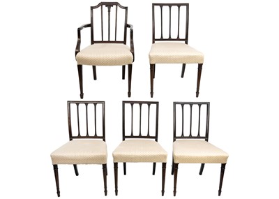 Lot 580 - A set of four late George III mahogany dining chairs.