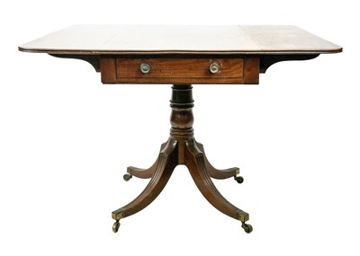 Lot 571 - A Regency mahogany twin flap table.