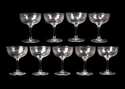 Lot 389 - A set of nine Edwardian glass champagne tazzae.