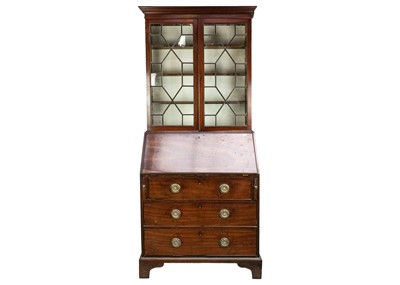 Lot 648 - A George III mahogany bureau bookcase.