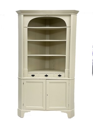 Lot 1712 - A late Victorian painted pine corner cupboard.