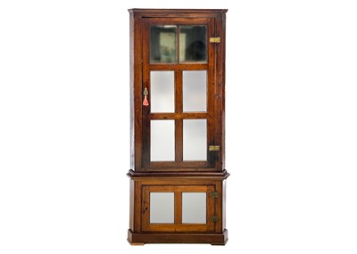 Lot 1713 - A late George III mahogany standing corner cupboard.