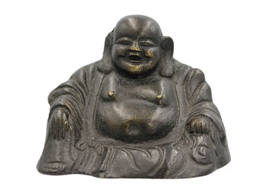 Lot 492 - A Chinese bronze model of a seated Buddha, 18th/19th century.