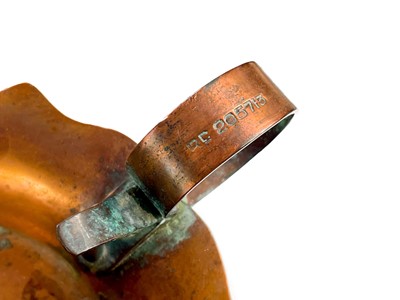 Lot 125 - A copper chamberstick by Henry Loveridge.