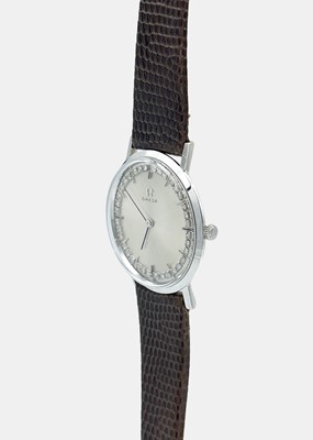 Lot 156 - OMEGA - A 14ct white gold diamond set gentleman's manual wind dress watch.
