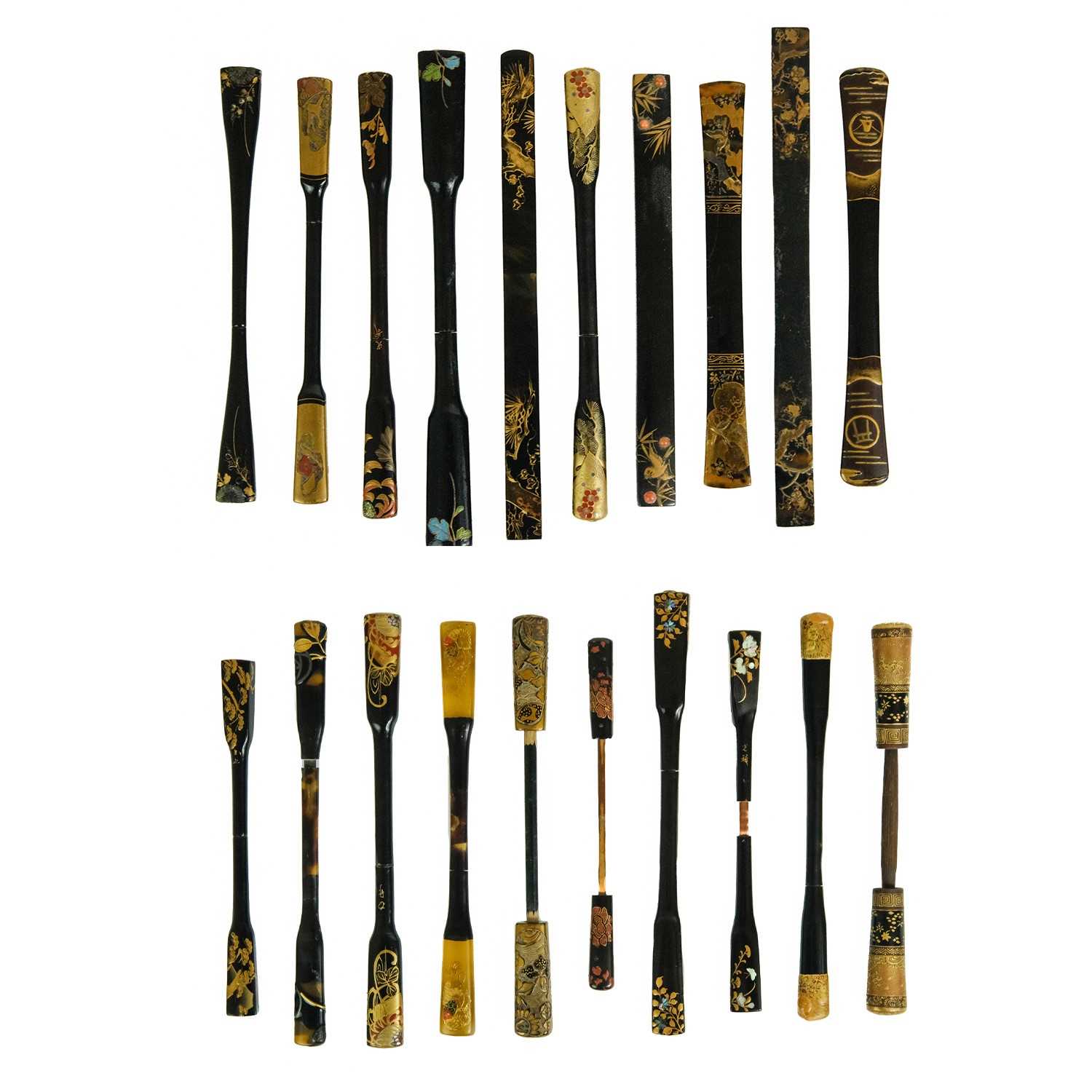 Lot 495 - Twenty Japanese black and mainly gilt laquer kogai, 19th/20th century.